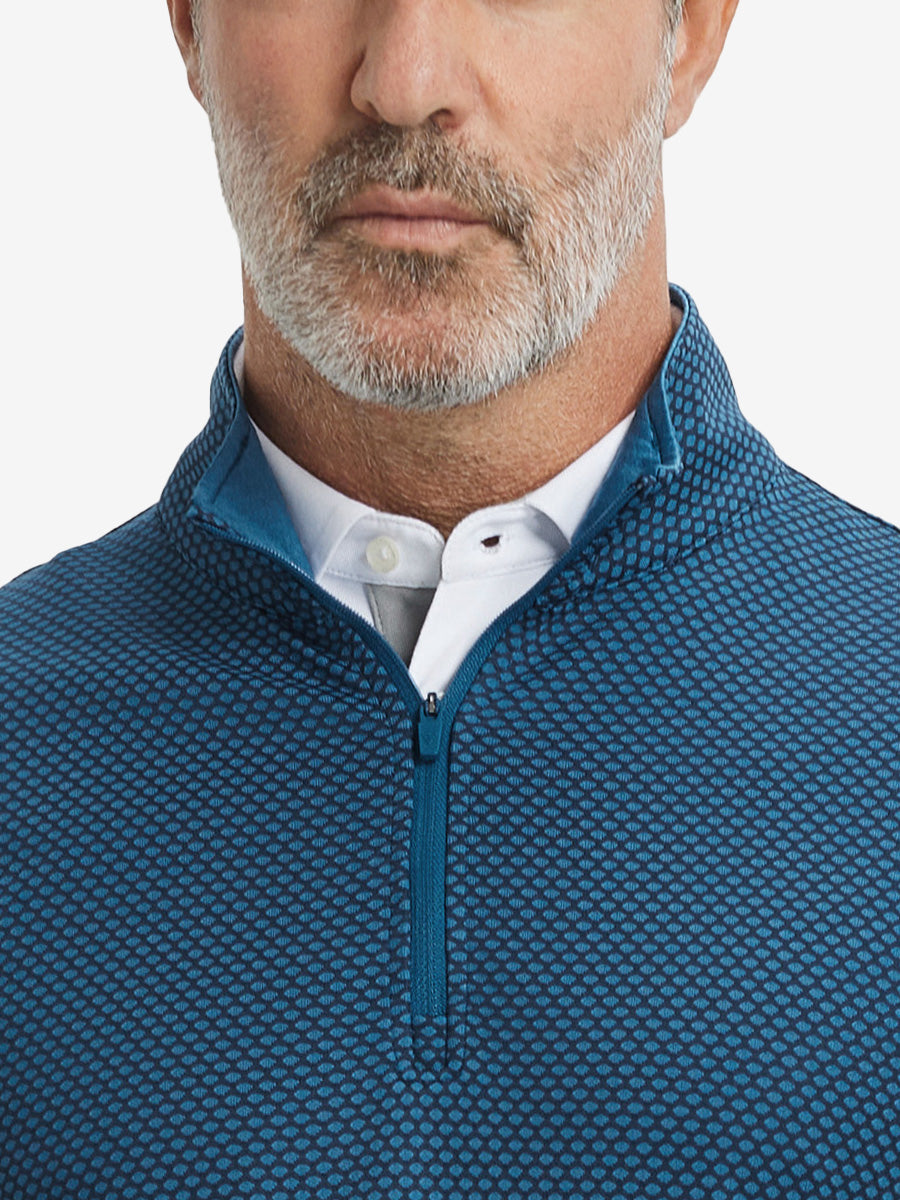 Close-up of collar area on jacquard quarter zip pullover in navy/blue, highlighting refined jacquard detail.