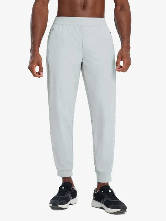 Front lower body view of model wearing GLACIER GREY Performance Tapered Sports Joggers