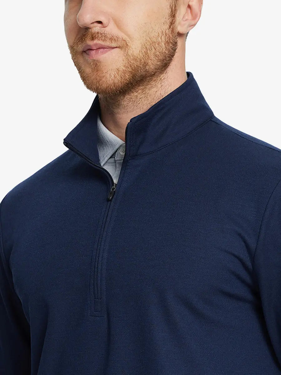 Front half-body view from nose down of model wearing NAVY Premium Jacquard Quarter Zip Pullover.								

