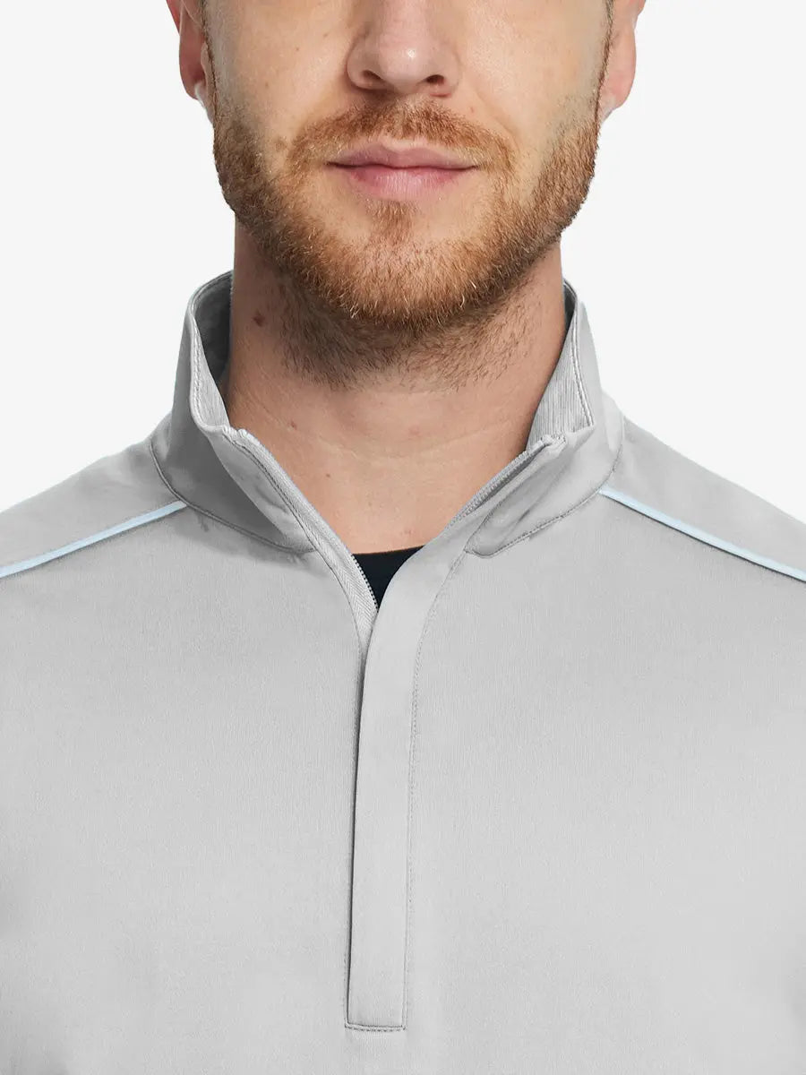 Front half-body view from nose down of model wearing TAUPE Stretch Solid Fleece Quarter-Zip Vest.								
