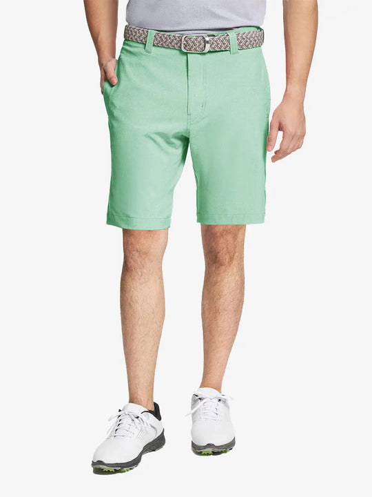 MINT GREEN 9 Inch Heather Performance Golf Shorts with front view, model's lower body and side pockets visible