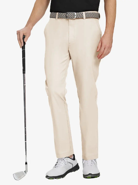 LIGHT KHAKI Water Resistant Everyday Pants front view, model's lower body holding a golf club