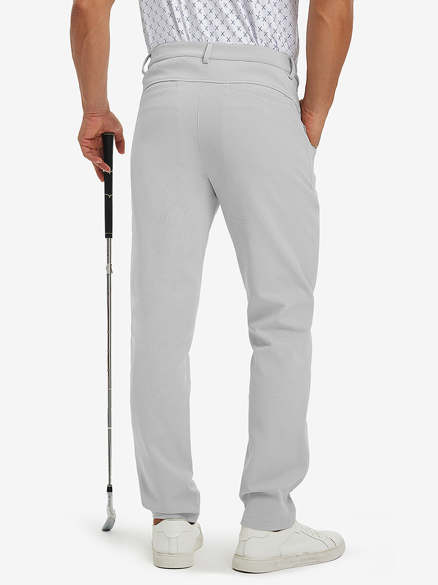 3D back view of lightweight moisture wicking dress pants on model holding golf club in silver grey.
