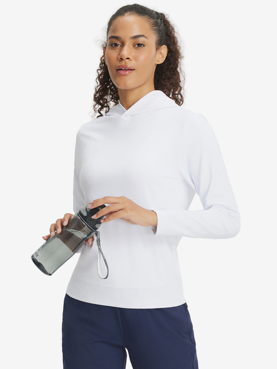 Model holding hoodie cap with both hands, wearing women's lightweight hoodies pullover in white.