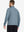 Back view of model wearing quarter zip melange pullover saxony blue melange.