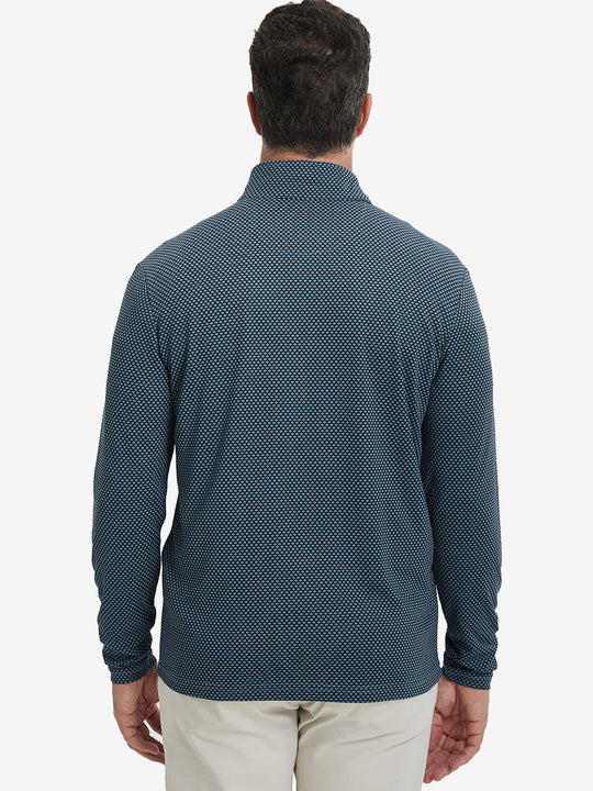 Back upper view of model wearing jacquard quarter zip pullover in black/blue, showing clean seam lines.
