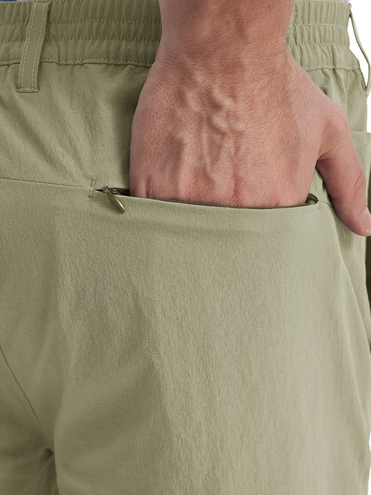 Back view of Performance Water Resistant Pants in KHAKI，model’s hand casually in back pocket.
