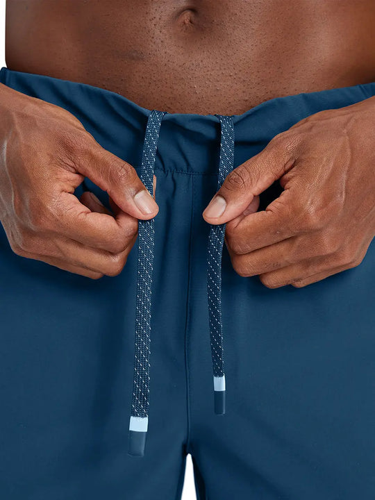 Close-up detail of waistband on BLUE INDIGO Performance Tapered Sports Joggers