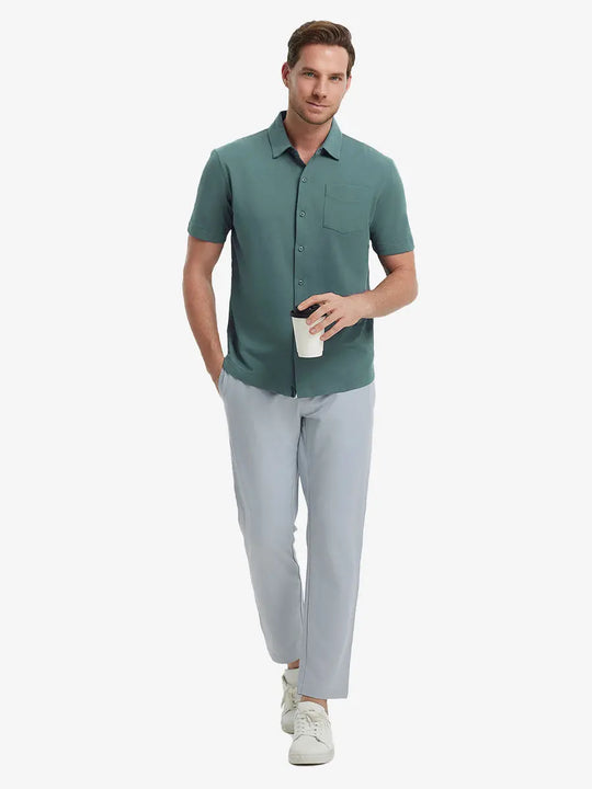 Full-body view of model holding takeaway drink cup in SEA MOSS Cotton Blend Plain Shirt.