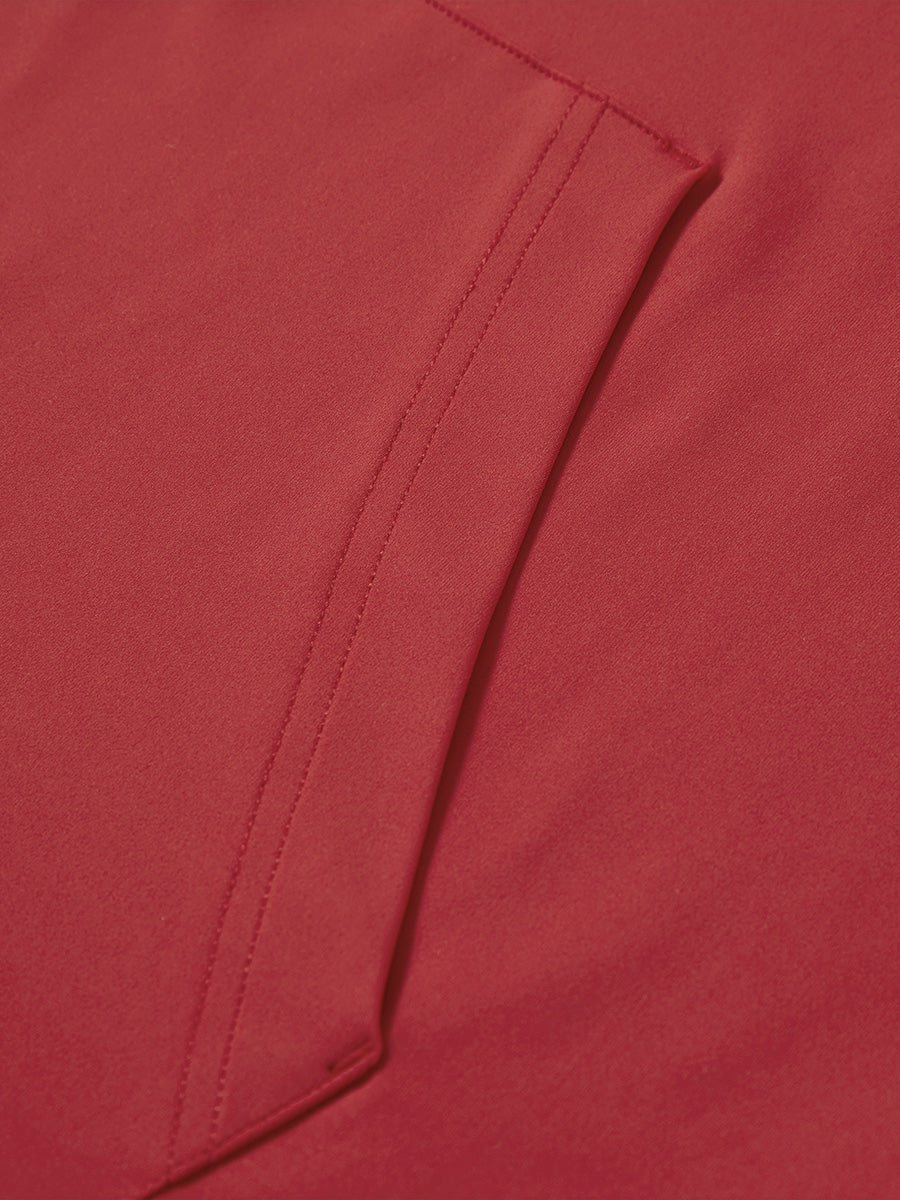 Close-up of single pocket detail on youth long sleeve hoodied with kangaroo pocket in red, showing stitching.