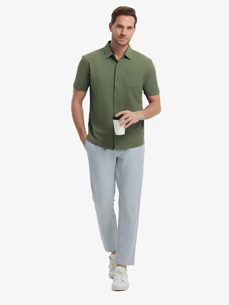 Full-body view of model holding takeaway drink cup in OLIVE GREEN Cotton Blend Plain Shirt.