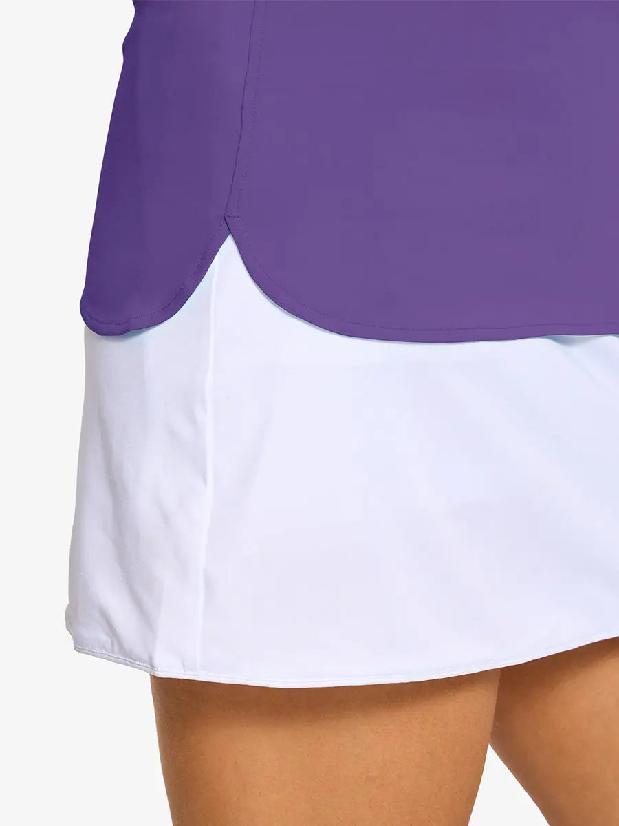 Detail shot of side hem opening on PURPLE Women's Performance Solid Polo