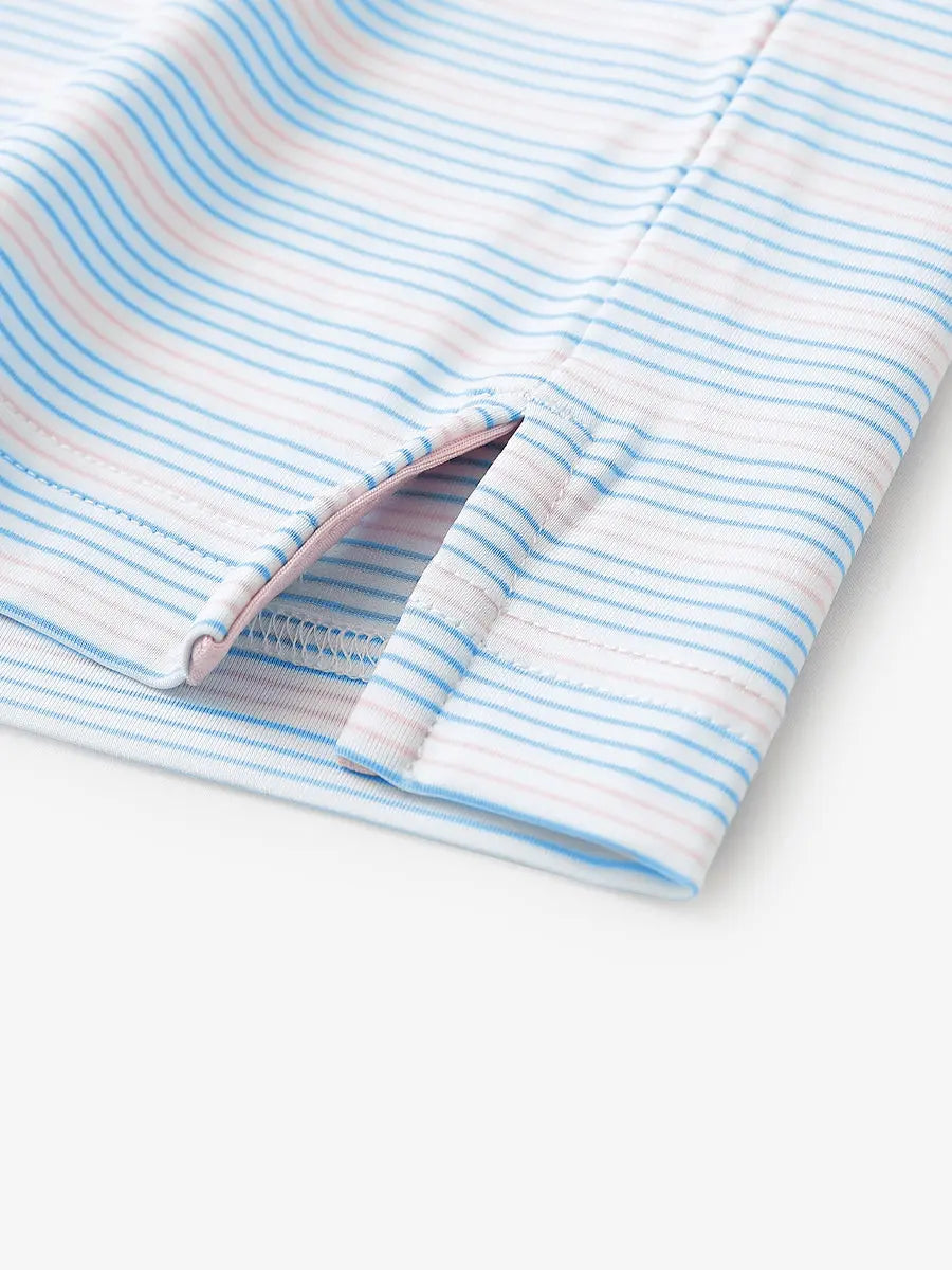 Close-up of side hem slit on Blue Pink Stripe Performance Stripe Golf Shirt