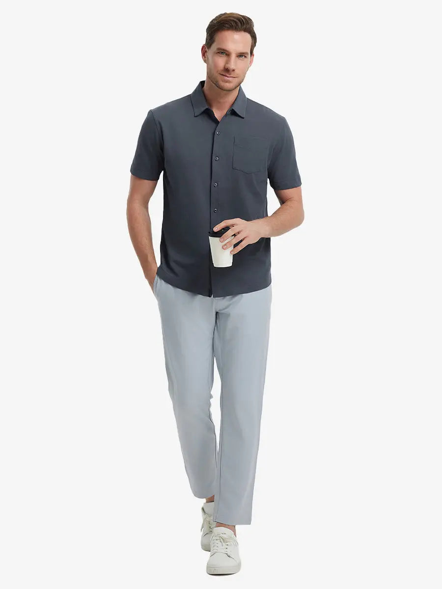 Full-body view of model holding takeaway drink cup in DARK GREY Cotton Blend Plain Shirt.