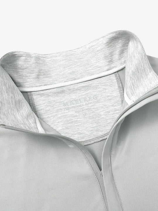 Close-up of collar and interior logo detail on TAUPE Stretch Solid Fleece Quarter-Zip Vest.								

