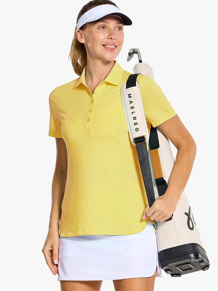 Front half-body of model in YELLOW Women's Performance Solid Polo holding golf club