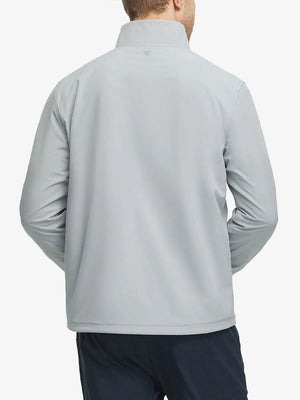 Back half-body view of the model highlighting the Light Grey jacket’s clean silhouette