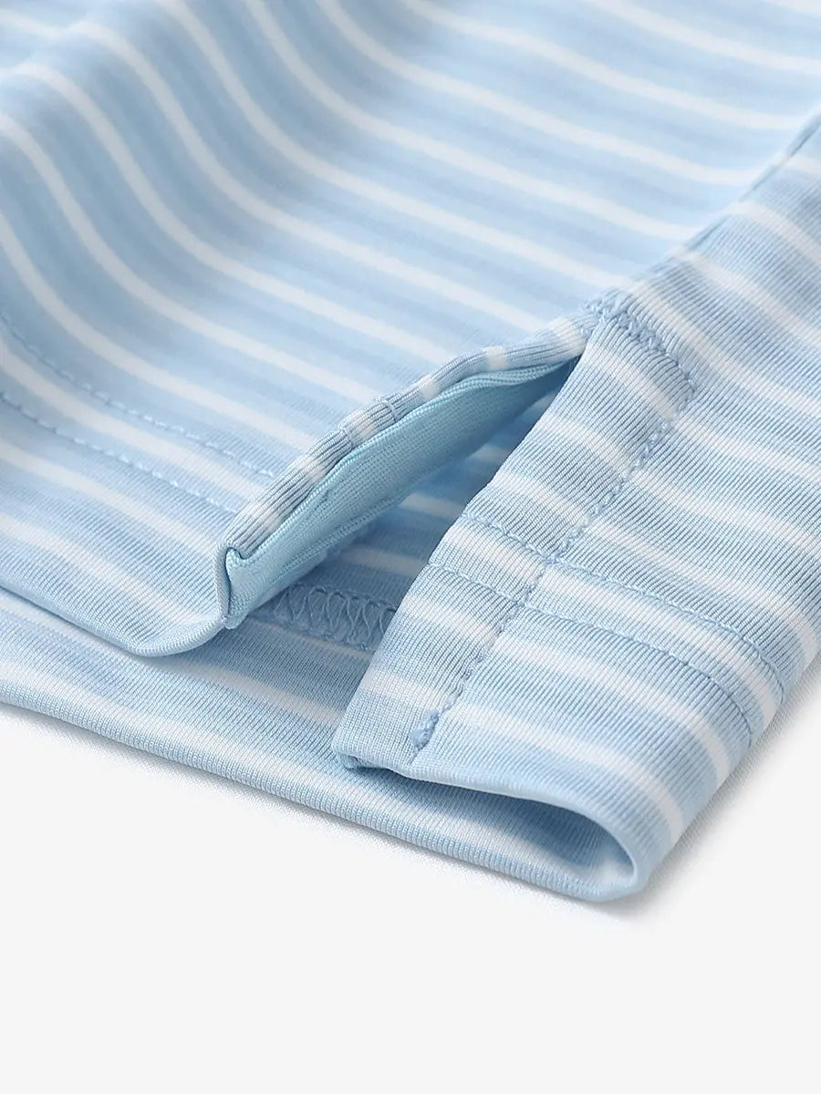 Close-up detail of hem opening on Sport Fit Stripe Polo in Blue Denim Stripe
