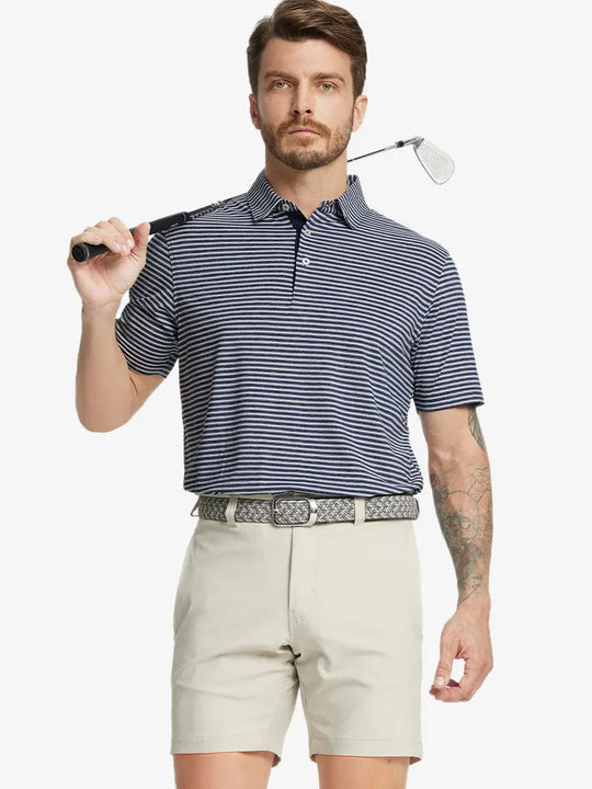 Front half-body shot of model holding golf club, wearing Sport Fit Stripe Polo in Navy Stripe